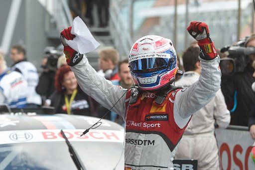 Miguel Molina of Spain cheer after winning the qualifying for the second race in the German Touring Car Masters (DTM) on the Nuerburgring race track in Nuerburg, Germany, 27 September 2015. Photo: Thomas Frey\/