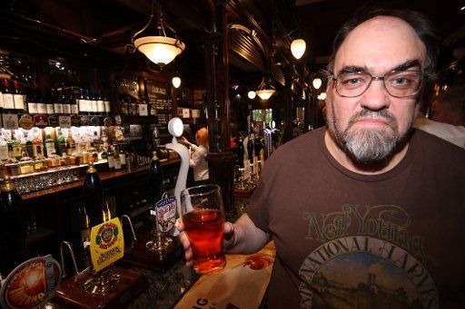 David Brazier of the CAMRA initiative poses at the Bridge Hotel in Newcastle, England, 25 June 2015. CAMRA supports the serving of ale in addition to regular beer in pubs. Many pubs across Britain are closing, with some owners blaming alcohol checks,...