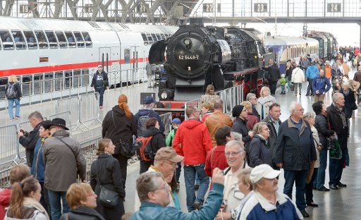 Historic railway vehicles (R) can be seen next to a new IC 2. train at the main train station in Leipzig, Germany, 24 October 2015. Numerous events are taking place to celebrate the 100th birthday of the Leipzig main train station, once the largest ...