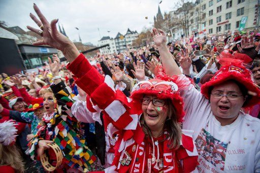 Carnival revelers celebrate the start of carnival season in Cologne, Germany, 11 November 2015. The season has begun in the Rhineland carnival strongholds. Celebrations began on time at 11:11. Photo: MAJA HITIJ\/