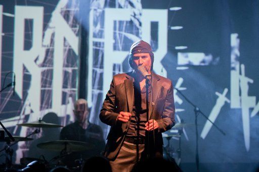 Singer from the Slovenian band Laibach, Milan Fras (C), performs on stage in Nuremberg, Germany, 13 January 2016. The band was founded in 1980 in the former Yugoslavia and their music is a mixture of industrial rock and electronic music. The band\