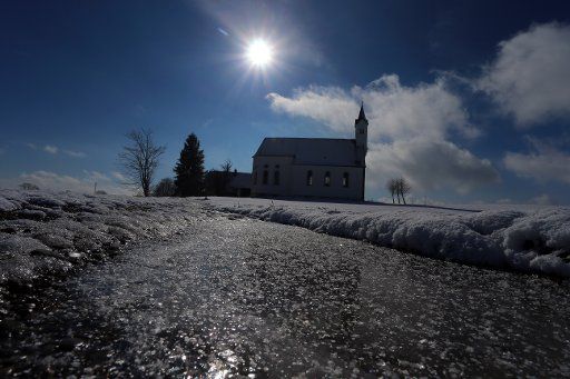The Sankt Alban church surrounded by ice and snow near Aitrang, Germany, 24 February 2016. PHOTO: KARL-JOSEF HILDENBRAND \/