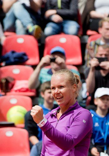 Dutch tennis player Kiki Bertens celebrates her win during the WTA tennis tournament in Nuremberg, Germany, 18 May 2016. Taking place is a match between her in the second round against the Italian woman Roberta Vinci. Photo: DANIEL KARMANN\/