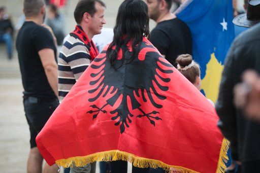 A soccer fan with a flag of Albania in front of the stadium before the international soccer match between Kosovo and Faroe Islands at Frankfurter Volksbank-Stadion in Frankfurt (Main), Germany, 3 June 2016. In May 2016, Kosovo became the 55th member ...