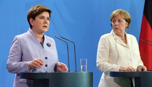 German Chancellor Angela Merkel (R) and Polish Prime Minister Beata Szydlo (L) answer questions from journalists during a press conference in the Federal Chancellery in Berlin, Germany, 22 June 2016. The politicians met for German-Polish government ...
