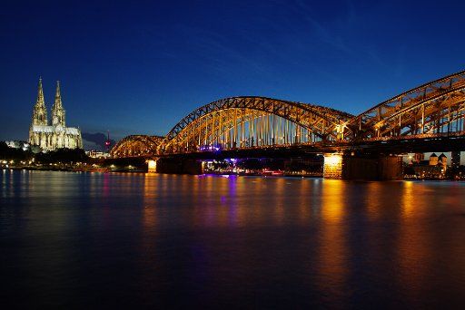 A picture dated 19 June 2016 shows Cologne cathedral with the Hohenzollern bridge in Cologne, Germany, 19 June 2016. Photo: Kevin Kurek\/dpa - NO WIRE SERVICE -
