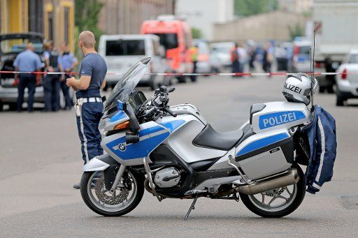 A policeman blocks off a street after a probably find of n aerial bomb in Leipzig, Germany, 21 July 2016. The rusted, bomb-like looking item was found during groundworks in the borough of Eutritzsch and lied in an excavator shoval. Photo: Jan ...