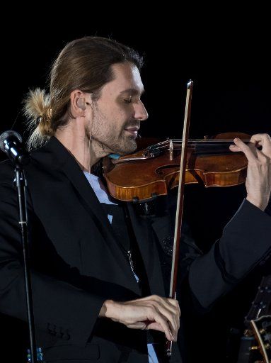 Violinist David Garrett plays on stage during his premiere at the Explosive Live! tour in the Volkswagenhalle in Braunschweig, Germany, 17 November 2016. Photo: PETER STEFFEN\/