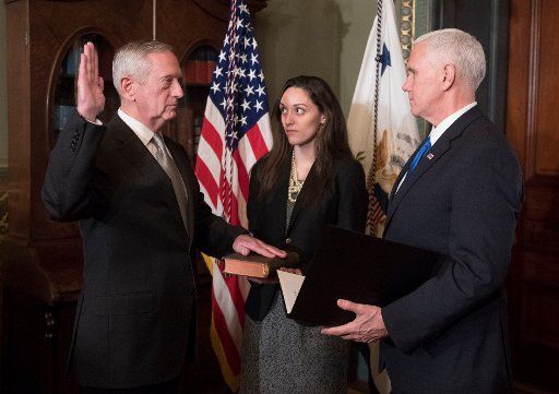 Marine Corps General James Mattis is sworn-in as Defense Secretary by Vice President Mike Pence, in the Vice Presidential ceremonial office in the Executive Office Building in Washington, D.C. on January 20, 2017. Photo by Kevin Dietsch\/UPI - NO ...