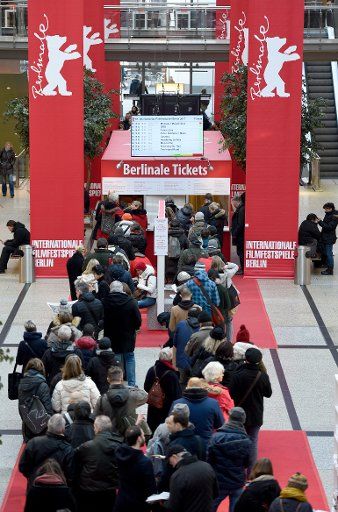 Festival visitors queue up in order to buy tickets for the 67th International Berlin Film Festival (\