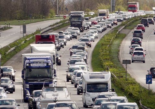 Cars are stuck in heavy traffic on the motorway A7 at the cross before the Rader high bridge in the direction of Flensburg and Denmark, near Rendsburg, Germany, 15 April 2017. Photo: Daniel Friederichs\/