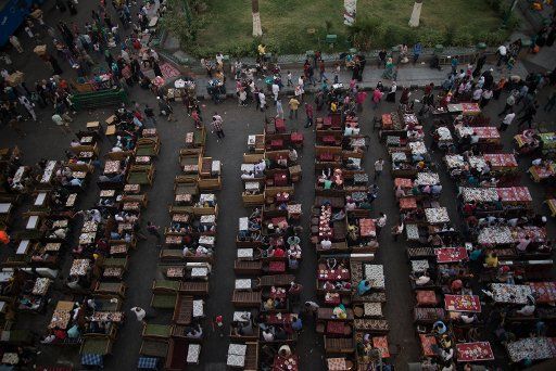 Egyptian Muslims break their fast after sunset with a traditional evening meal (Iftar) in Cairo, Egypt, 5 June 2017. During the month of Ramadan, devout Muslims fast from sunrise to sunset. Photo: Gehad Hamdy\/