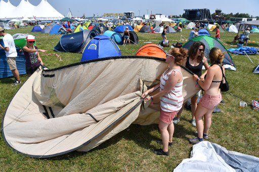 The camping site at the Southside Festival one day ahead of its opening in Neuhausen ob Eck, Germany, 22 June 2017. Thousands of festival goers had already scrambled across the field to find the best spots for their tents by midday. Photo: Felix Kä...