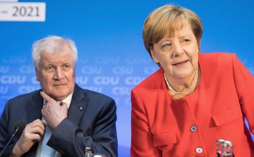 German chancellor and chairwoman of the CDU, Angela Merkel (R) sits next to CSU chairman Horst Seehofer at the start of a joint board meeting in Berlin, Germany, 3 July 2017. The parties will speak about their election program for the upcoming ...