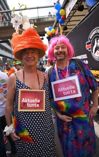 Participants of the Christopher Street Day Parade walk through the streets in beautiful costumes in Cologne, Germany, 9 July 2017. Photo: Henning Kaiser\/
