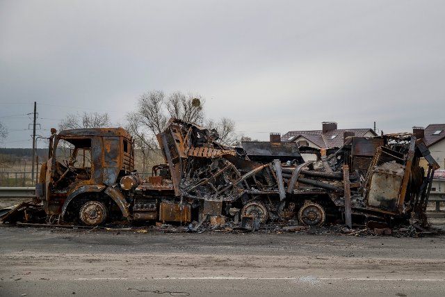 A destroyed Russian Army vehicle is seen at a road in Bucha, Ukraine, 12 April 2022. Ukrainian authorities found ten lifeless bodies on Tuesday in a mass grave in Bucha, west of Kyiv, where Russian troops committed a massacre during their occupation. The discovery of these mass graves in Bucha, from which the Russians withdrew last week, has been described by Ukraine\