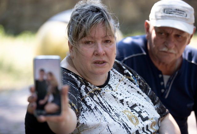 Lyudmyla, 55, displays a photo of her daughter Tanya Bryhadyrenko, 22, who are missing since a Russian missile attack destroyed a mall in the city of Kremenchuk, Ukraine, 29 June 2022. At least 20 people died and dozen people are missing in the attack happened last 27 June. EFE\/ Orlando Barria