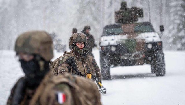 French soldiers during exercise at the Winter Camp in Estonia on Feb 2, 2022. U.S. President Joe Biden has approved the deployment of nearly 3,000 American troops to eastern Europe in the coming days amid mounting tensions with Russia over Ukraine in what the Pentagon said on Wednesday February 2, 2022 was a signal of U.S. readiness to defend NATO allies