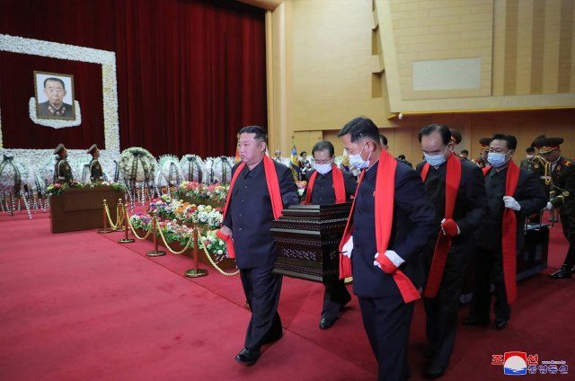 North Korean leader Kim Jong Un carries the casket during the state funeral for Marshal of the Korean People\