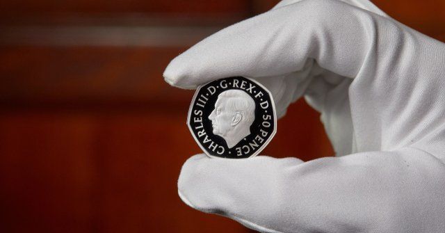 The first official coin portrait of King Charles III which has been designed by Martin Jennings FRSS and personally approved by His Majesty is revealed on Friday Sept 30, 2022. The first coins to feature the effigy are part of a memorial collection for Her Late Majesty Queen Elizabeth II which will be released on 3 October. The 50p will be entering circulation in the coming months. (The Royal Mint\/EYEPRESS
