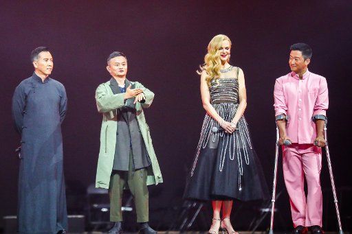 Jack Ma, second left, talks about his new movie Gong Shou Dao, as Nicole Kidman, second right, an Wu Jing, right, and Hong Kong action star Donnie Yen show up in the star-studded 2017 Tmall 11.11 Global Shopping Festival gala, in Shanghai, China ...