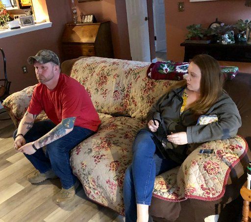 Michael and Kaitlin Puccini visit the Eustis home of the late Army Pfc. Derek Gibson\