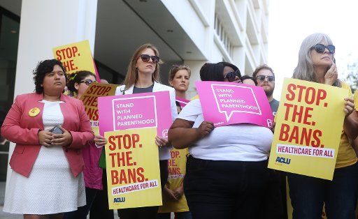 June 28, 2019 Atlanta- Supporters of Planned Parenthood and the ACLU hold signs at a press conference following the American Civil Liberties Union, the ACLU of Georgia, the Center for Reproductive Rights, and Planned Parenthood filing of a lawsuit challenging Georgia\