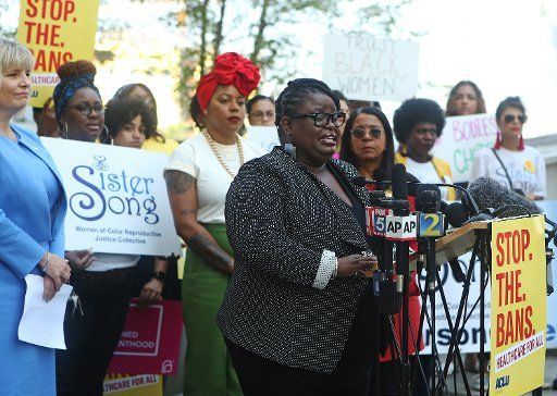 In this file photo, Monica Simpson, executive director of SisterSong, speaks at a press conference following the American Civil Liberties Union, the ACLU of Georgia, the Center for Reproductive Rights, and Planned Parenthood filing of a lawsuit challenging Georgia\