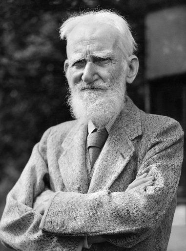 Irish author and dramatist George Bernard Shaw poses at his Ayot St Lawrence house in the United Kingdom in July 1946 a few days before his 90th birthday. (AFP\/AFP via Getty Images\/TNS