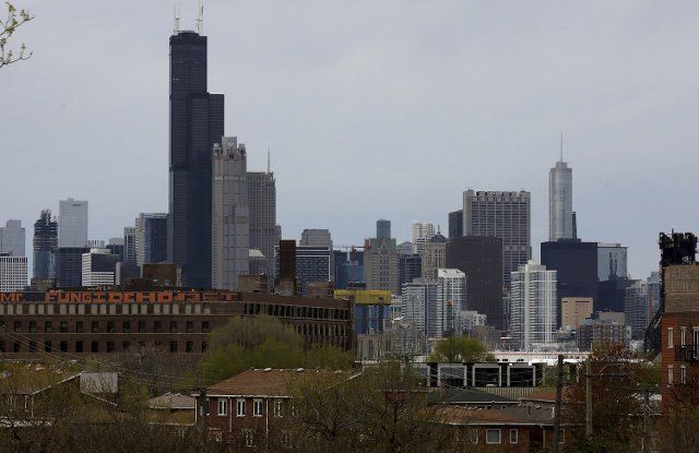 The Chicago skyline looms over the near south neighborhoods on May 8, 2022. Updated 2020 census numbers did not come with demographic or geographic specificity, so itâs not certain who new Illinois residents are or where they settled. (Antonio Perez\/Chicago Tribune\/TNS