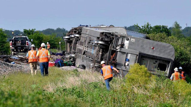 Several cars of an Amtrak train traveling from Los Angeles to Chicago derailed Monday afternoon after it struck a dump truck at a crossing in northern Missouri, Amtrak announced. More than 200 people were on board the train at the time of the crash, which was first reported at about 12:43 p.m. near Mendon, Missouri, according to the Missouri State Highway Patrol. Three people were killed in the crash, the patrol said, including two people on the train and one person in the dump truck. (Rich Sugg\/The Kansas City Star\/TNS