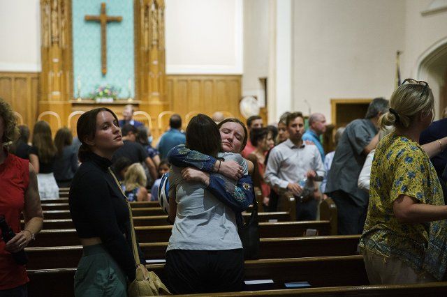 Hannah Peschier, 22, right, hugs her mother Christine Peschier, 54, left, after a service at Highland Park Presbyterian Church on July 5, 2022, the day after seven people were killed and at least two dozen were wounded in a shooting during the Fourth of July parade in Highland Park. (Armando L. Sanchez\/Chicago Tribune\/TNS