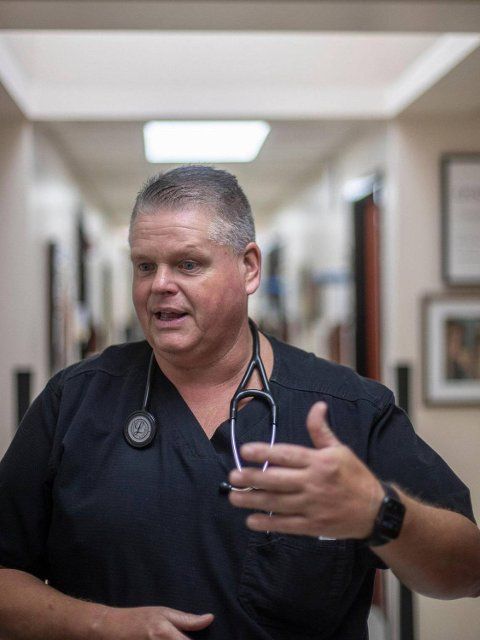 Van Breeding, clinical director at MCHC Whitesburg Medical Clinic in Whitesburg, Kentucky, talks Monday, Aug. 1, 2022, about what it took to open the clinic days after it was covered in mud from devastating flooding. (Ryan C. Hermens\/Lexington Herald-Leader\/TNS