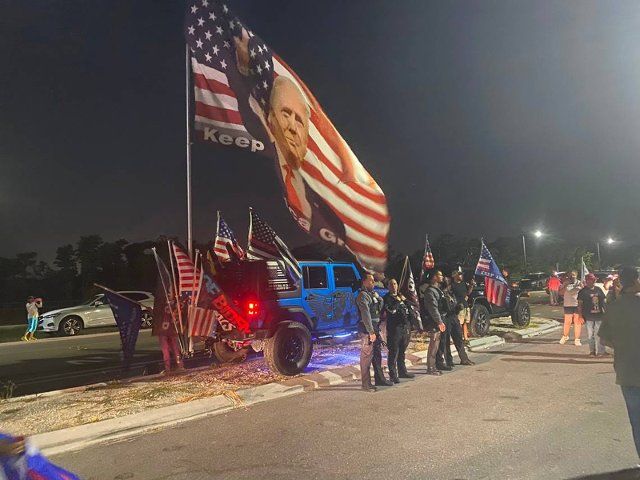 Police standby at the approach to Mar-a-Lago in Palm Beach on Monday night, Aug. 9, 2022, as supporters of former President Donald Trump turn out after an FBI raid of the former presidentâs residence earlier in the day. (Nicholas Nehamas\/Miami Herald\/TNS