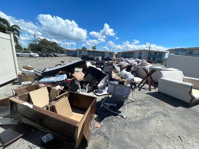 Water-damaged furniture waits to be picked up at the Stillwater Cove apartments in Naplesâ River Park neighborhood on Saturday, Oct. 1, 2022, in Florida. (Omar RodrÃ­guez Ortiz\/Miami Herald\/TNS
