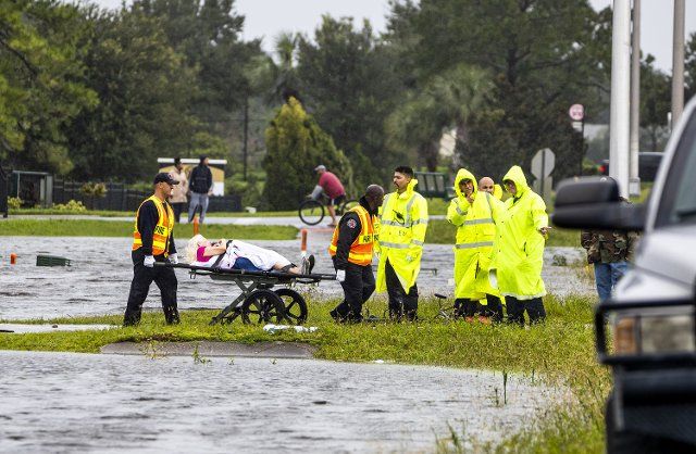 A resident of Avante At Orlando, a nursing home on Semoran Boulevard, is evacuated from flood waters in the wake of Hurricane Ian on Sept. 29, 2022. (Patrick Connolly\/Orlando Sentinel\/TNS