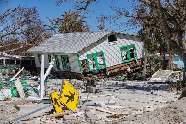 A damaged home caused by Hurricane Ian seen along Fort Myers Beach, Florida, on Monday, Oct. 3, 2022. (Al Diaz\/Miami Herald\/TNS