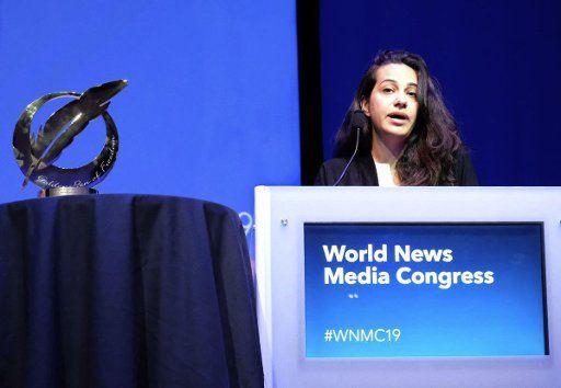 Saudi journalist Safa al-Ahmad speaks after accepting the Golden Pen of Freedom award in the name of fellow journalist Jamal Khashoggi at the World News Media Congress on June 1, 2019, in Glasgow, Scotland. Khashoggi was killed at the Saudi consulate in Istanbul in October 2018. (Kyodo) ==Kyodo