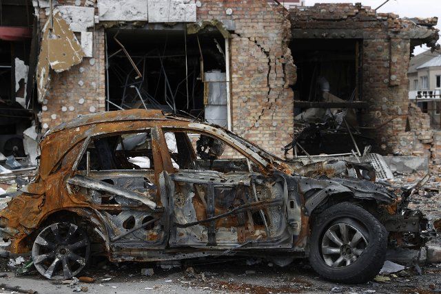 Photo taken on April 12, 2022, shows a destroyed vehicle in Hostomel near Ukraine\