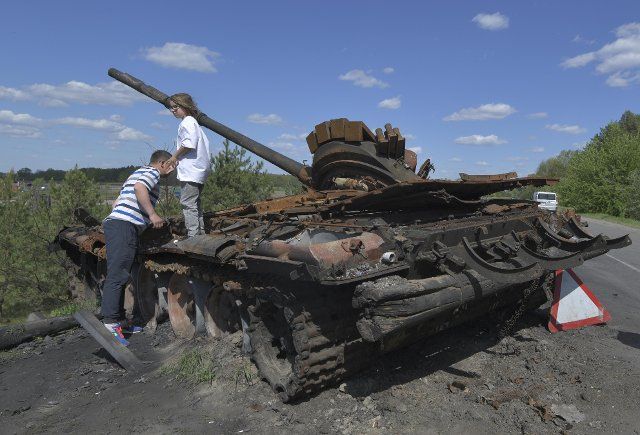 A destroyed Russian tank is left abandoned in the suburbs of the Ukrainian capital of Kyiv on May 10, 2022, as a war continues between Russia and Ukraine. (Kyodo) ==Kyodo