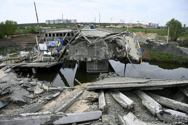 Photo taken in Irpin near Kyiv on May 20, 2022, shows a bridge destroyed by the Ukrainian military to prevent Russian tanks\