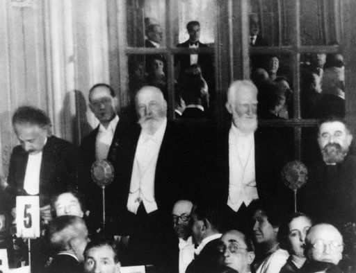 Albert Einstein (1879-1936), George Bernard Shaw (1856-1950), and Lord Rothschild (1868-1937), 1930. At a dinner honoring ORT in 1930, London.