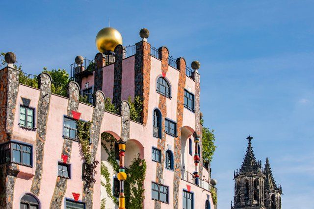 Facade of the architectural work of art Green Citadel and Magdeburg Cathedral, Hundertwasser House, Magdeburg, Saxony-Anhalt, Germany