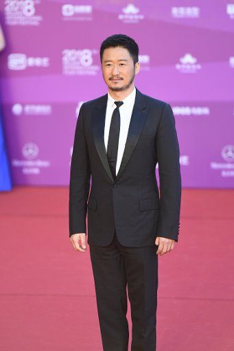 Chinese actor Wu Jing arrives on the red carpet for the opening ceremony of the 8th Beijing International Film Festival in Beijing, China, 15 April 2018.