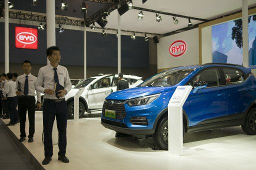 --FILE--People visit the stand of BYD during the 16th China (Guangzhou) International Automobile Exhibition, also known as Auto Guangzhou 2018, in Guangzhou city, south China\