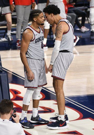 SPOKANE, WA - FEBRUARY 20: Gonzaga Gonzagaard Aaron Cook (4) and Gonzagaard Julian Strawther (0) react after Cook threw down a dunk during the game between the San Diego Toreros and the Gonzaga Bulldogs played at the McCarthey Athletic Center on February 20, 2021 in Spokane, Washington. (Photo by Robert Johnson\/Icon Sportswire