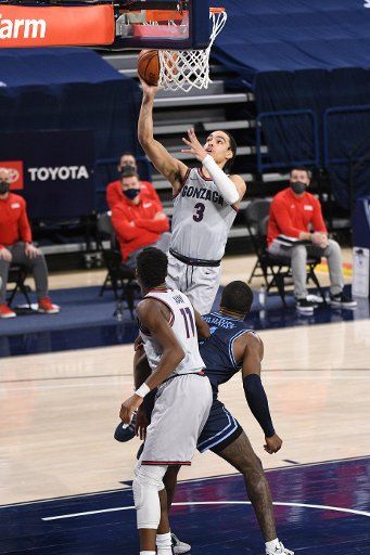 SPOKANE, WA - FEBRUARY 20: Gonzaga Gonzagaard Andrew Nembhard (3) goes up to score during the game between the San Diego Toreros and the Gonzaga Bulldogs played at the McCarthey Athletic Center on February 20, 2021 in Spokane, Washington. (Photo by Robert Johnson\/Icon Sportswire
