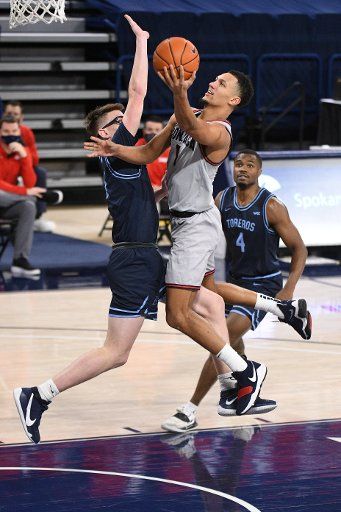 SPOKANE, WA - FEBRUARY 20: Gonzaga Gonzagaard Jalen Suggs (1) puts up a shot attempt as San Diego Gonzagaard Finn Sullivan (5) defends during the game between the San Diego Toreros and the Gonzaga Bulldogs played at the McCarthey Athletic Center on February 20, 2021 in Spokane, Washington. (Photo by Robert Johnson\/Icon Sportswire