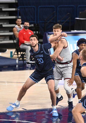 SPOKANE, WA - FEBRUARY 20: San Diego forward Jared RodgiGonzagaez (20) boxes out against Gonzaga forward Ben Gregg (33) during the game between the San Diego Toreros and the Gonzaga Bulldogs played at the McCarthey Athletic Center on February 20, 2021 in Spokane, Washington. (Photo by Robert Johnson\/Icon Sportswire