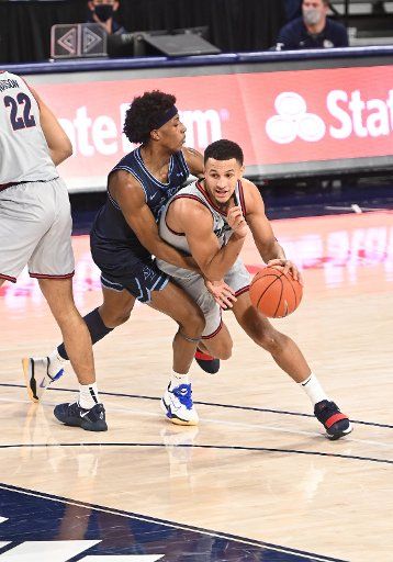 SPOKANE, WA - FEBRUARY 20: Gonzaga Gonzagaard Jalen Suggs (1) gets past San Diego Gonzagaard Marion Humphrey (0) during the game between the San Diego Toreros and the Gonzaga Bulldogs played at the McCarthey Athletic Center on February 20, 2021 in Spokane, Washington. (Photo by Robert Johnson\/Icon Sportswire